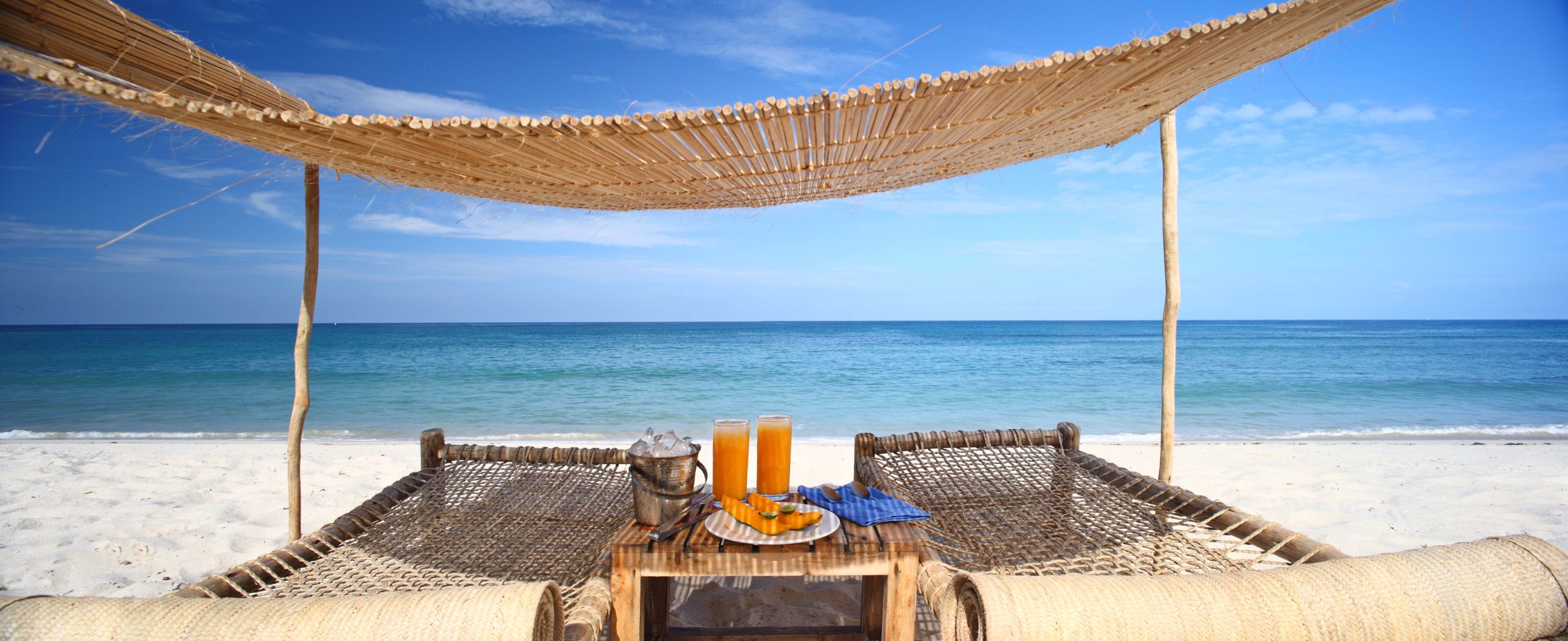 Ras Kutani Sun Loungers on the beach