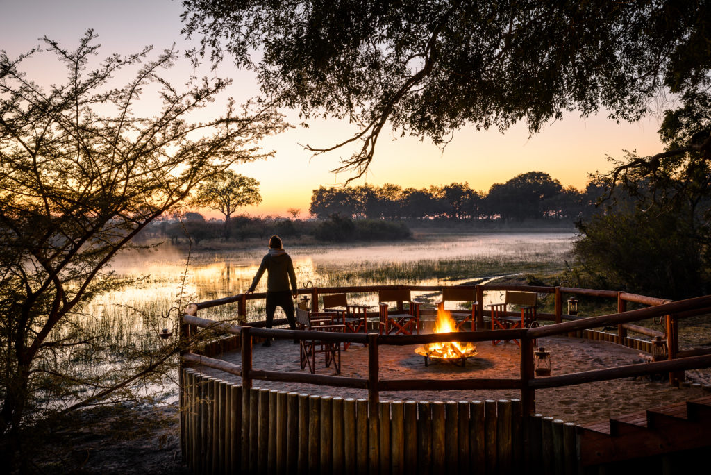 Botswana - Moremi Game Reserve - 1553 - Sanctuary Chief's Camp fire on the decking