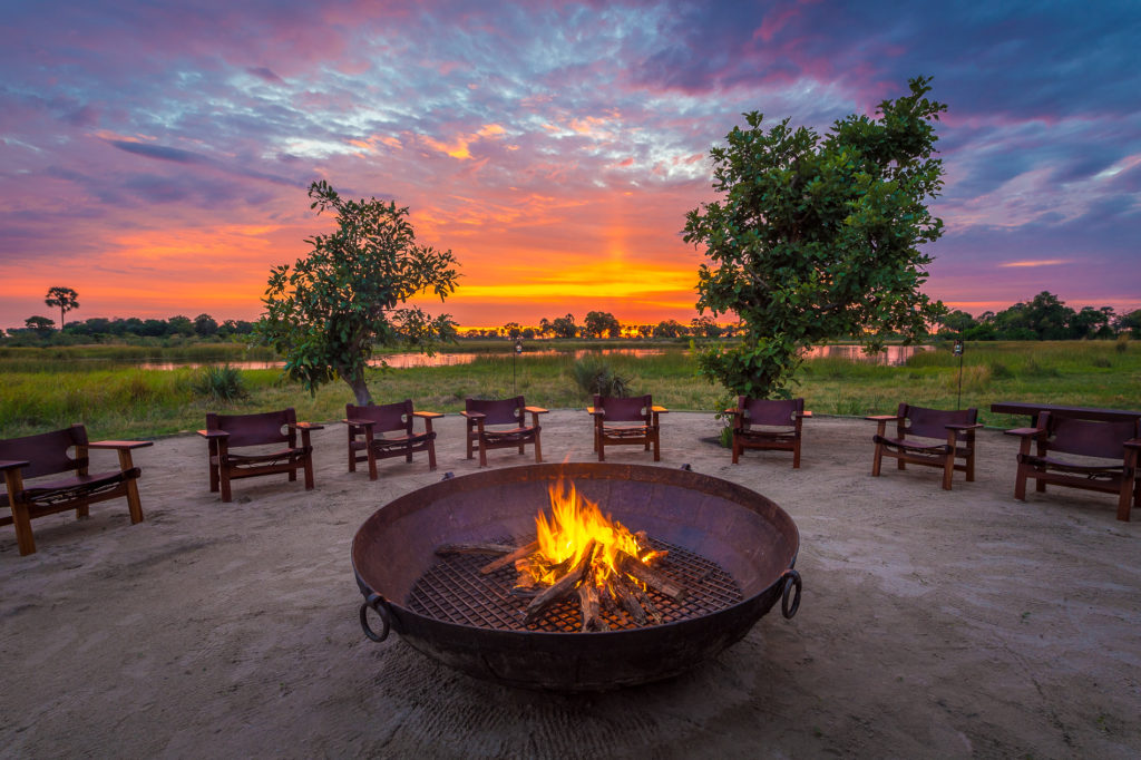 Botswana - Okavango Delta - 1553 - Qorokwe Camp Fire at sunset