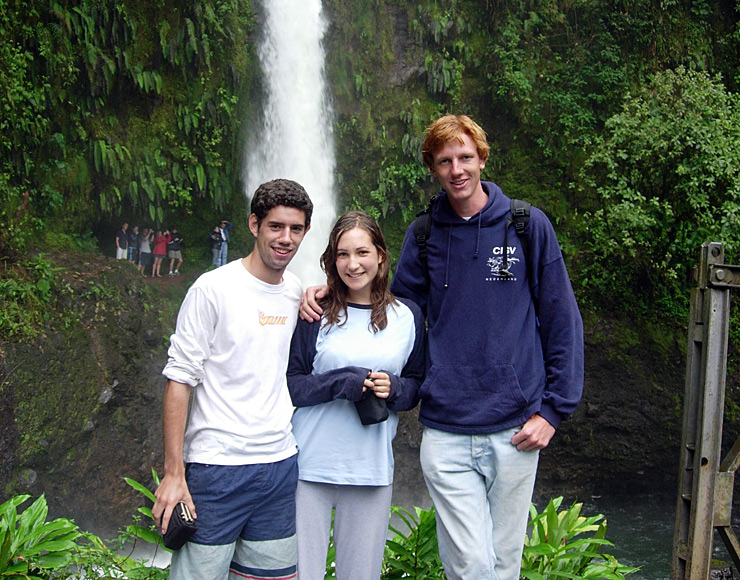 Waterfall in Costa Rica with three young people